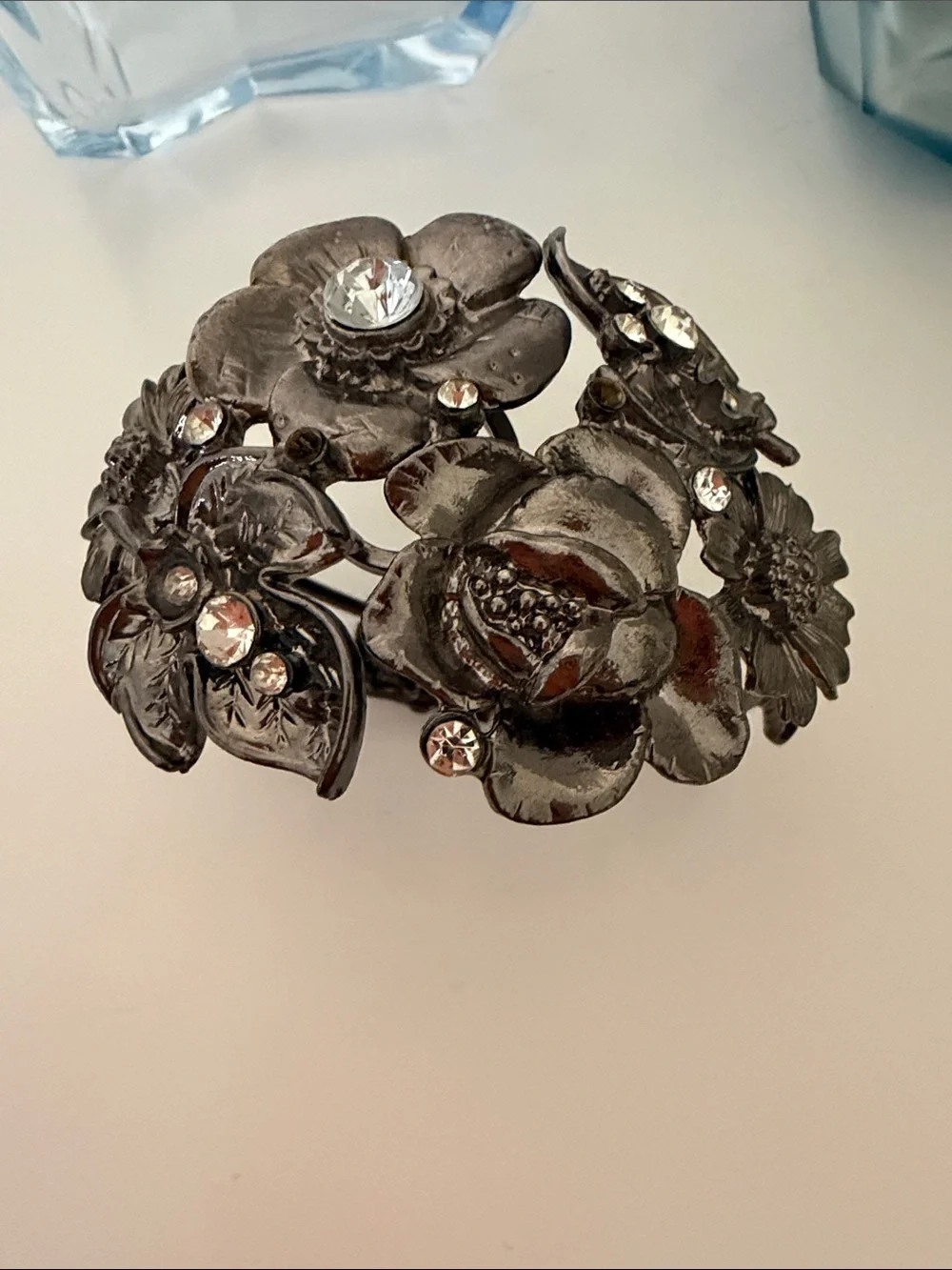 Floral Crystal Accent Bracelet - front snap shut , super cute! Silver tone